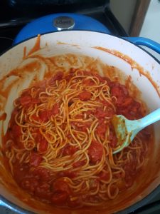 Spaghetti with sauce in dutch oven