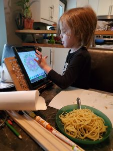 Jack with tablet and plain spaghetti